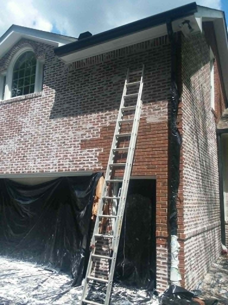In progress — upper facade