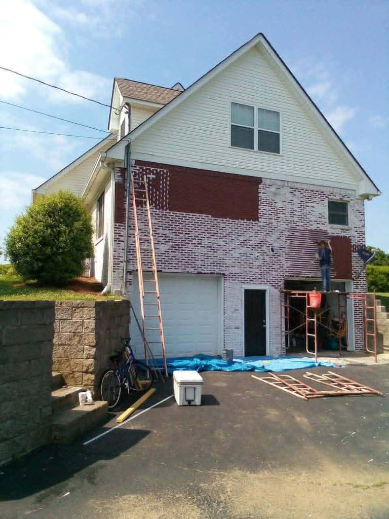Application in progress — red brick revealed
