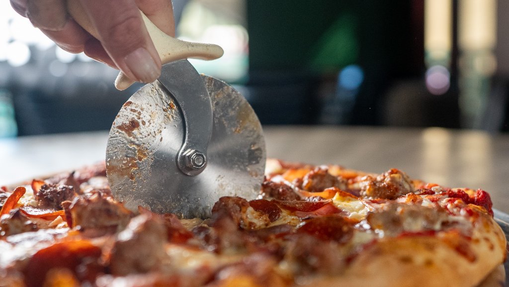 Slicing a pizza