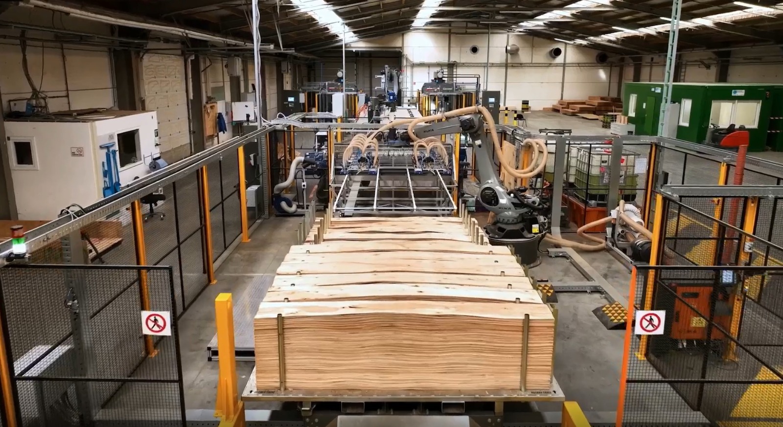 KUKA robotic arm processing veneer