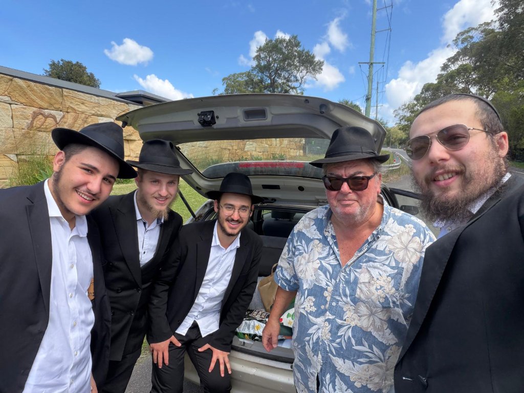 Gathering by the car