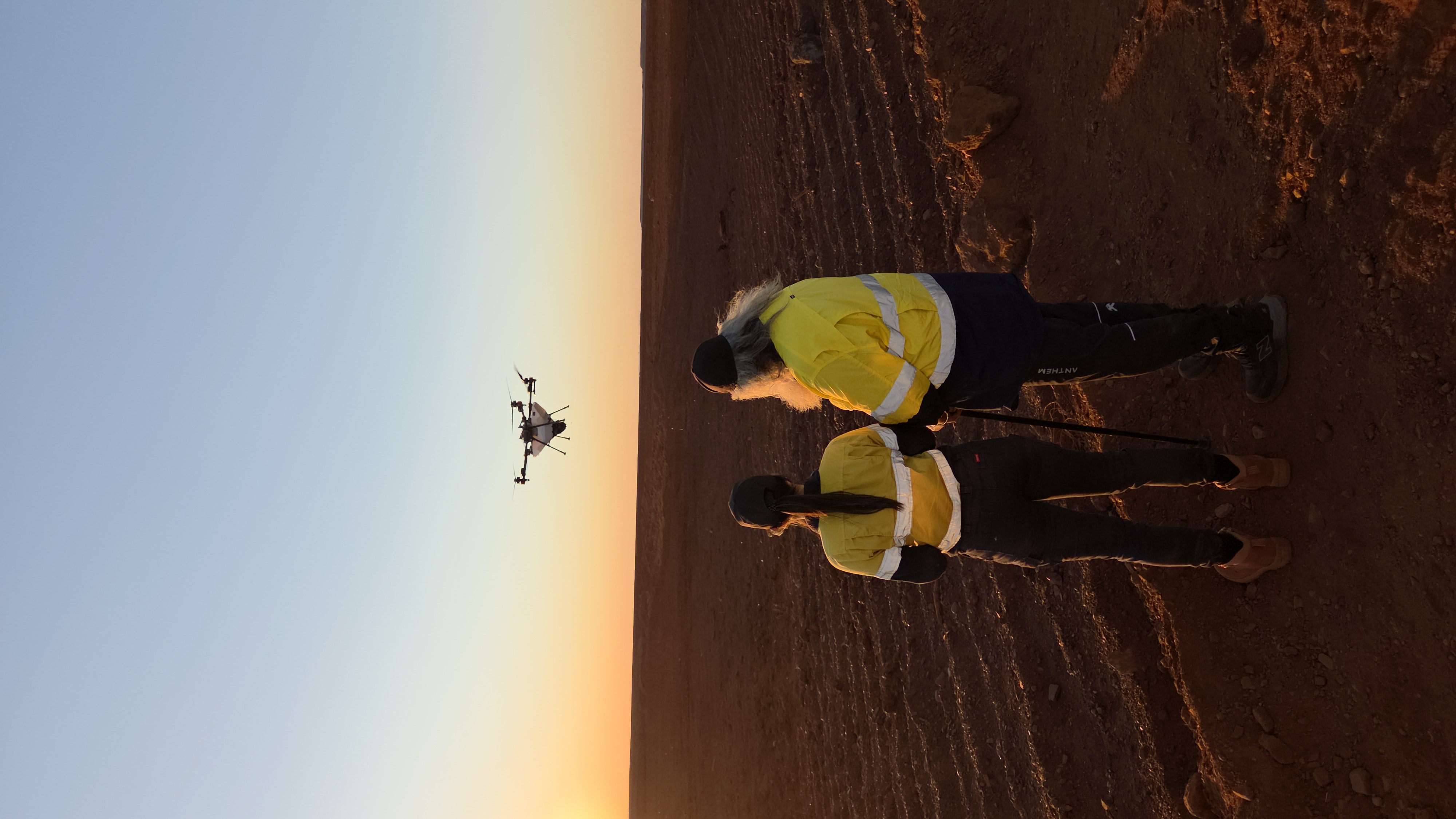 Surveying with a drone at sunrise