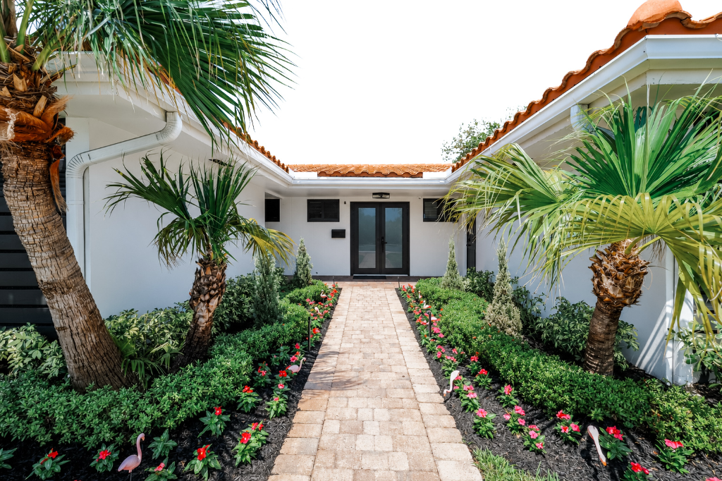 Agape Treatment Center entrance with palm trees