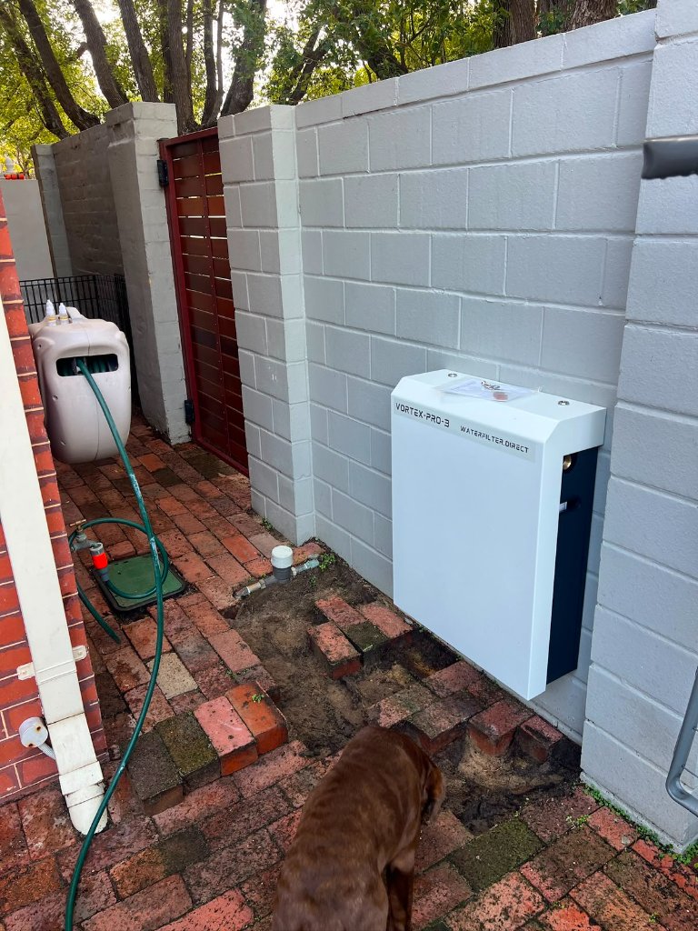 Outdoor water filtration setup by Checkmate Plumbing Perth