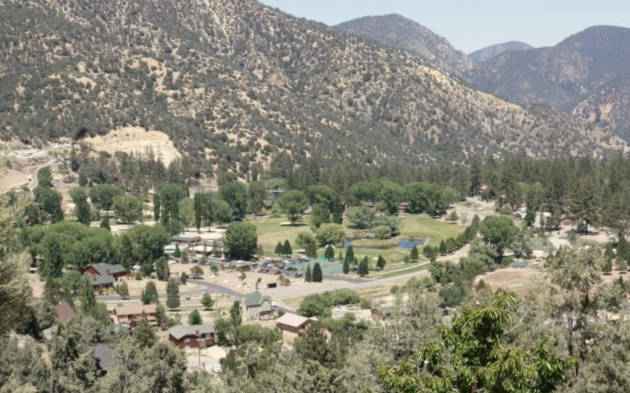 View over Pine Mountain Club, including the golf course, pond, Village area, and surrounding San Emigdio Mountains