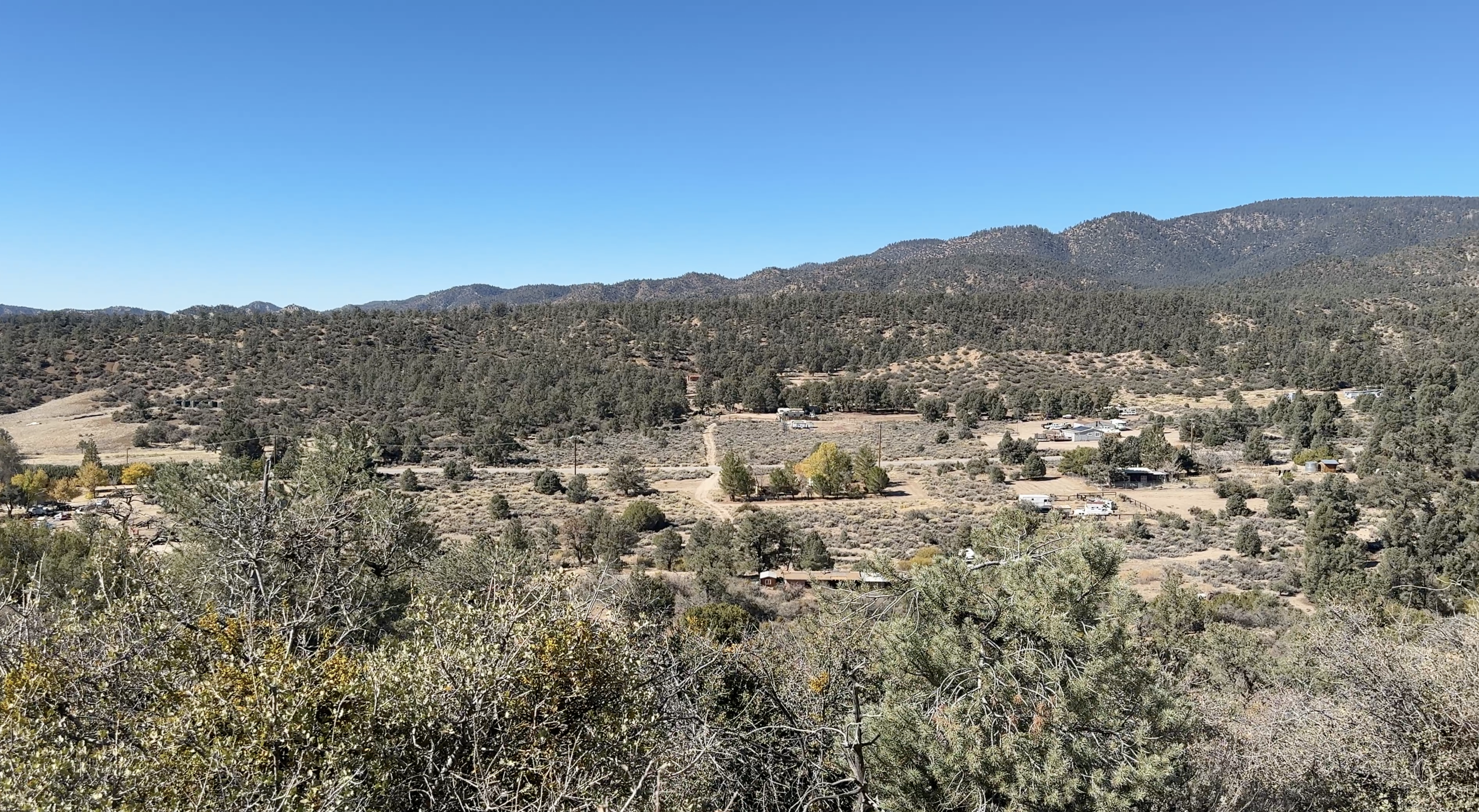 Homes and open land among wooded hills in Lockwood Valley