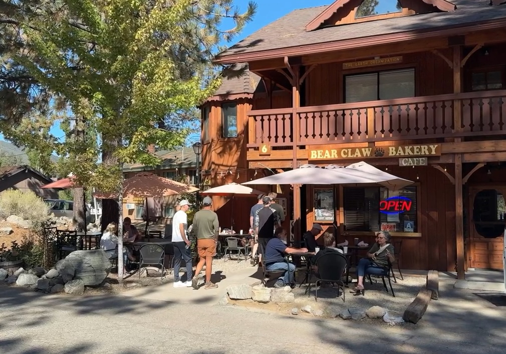Visitors outside Bear Claw Bakery in Pine Mountain Village