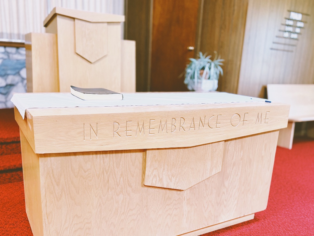 Communion table inscribed 'In Remembrance of Me'