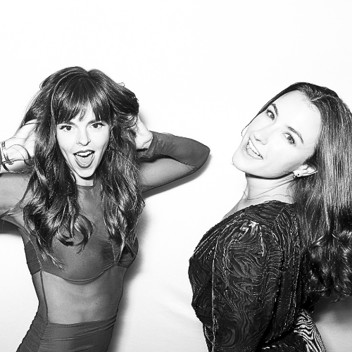 Guests laughing and celebrating together at a photo booth event
