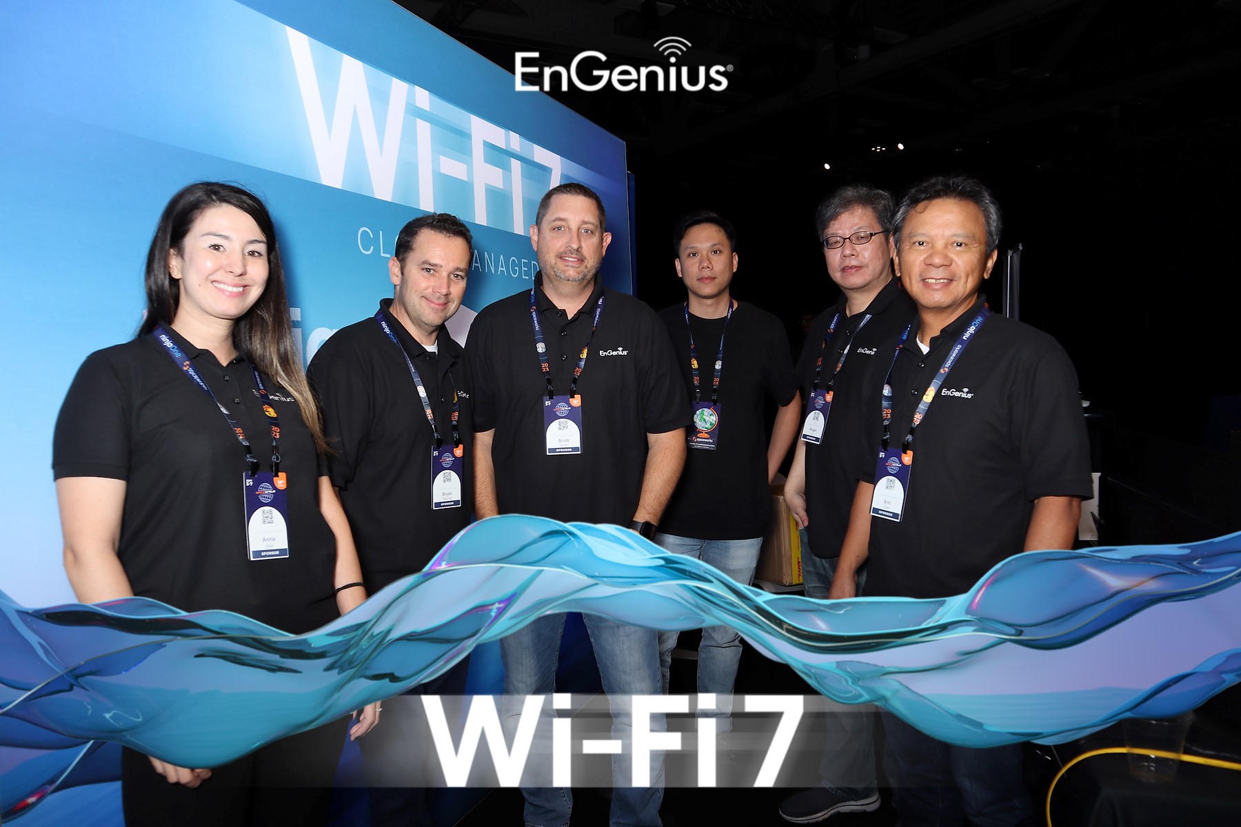 EnGenius trade show booth activation with branded Wi-Fi 7 display and team photo