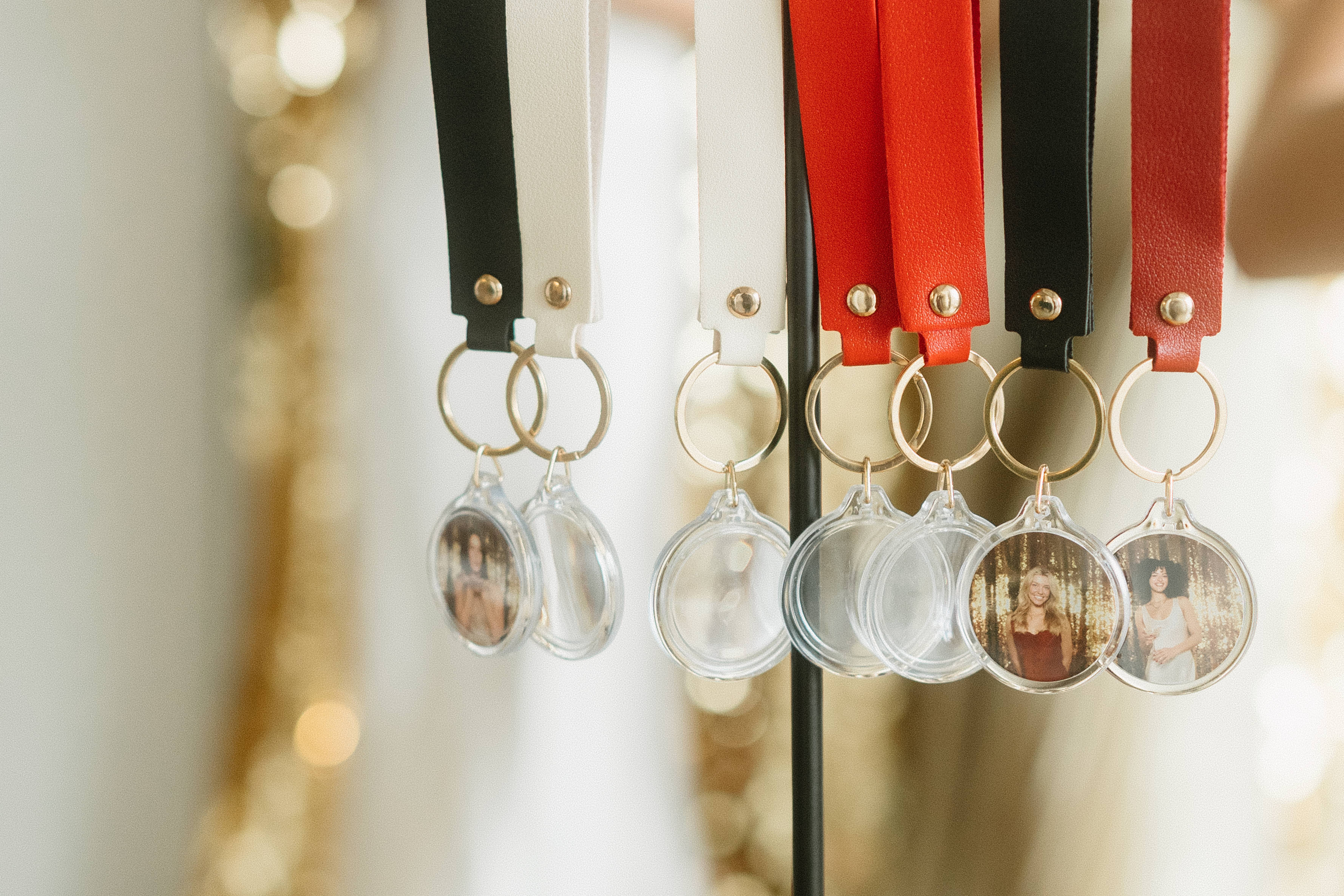 Guests taking photos with props at a party photo booth