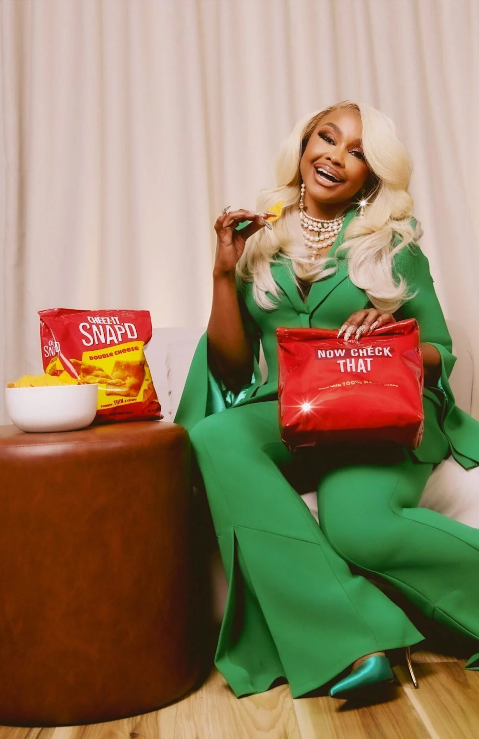 Phaedra Parks in an emerald green Jovani pant suit on the Cheez-It Snap'd commercial set