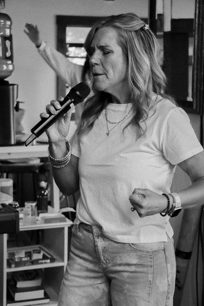 Worshipper singing into a microphone