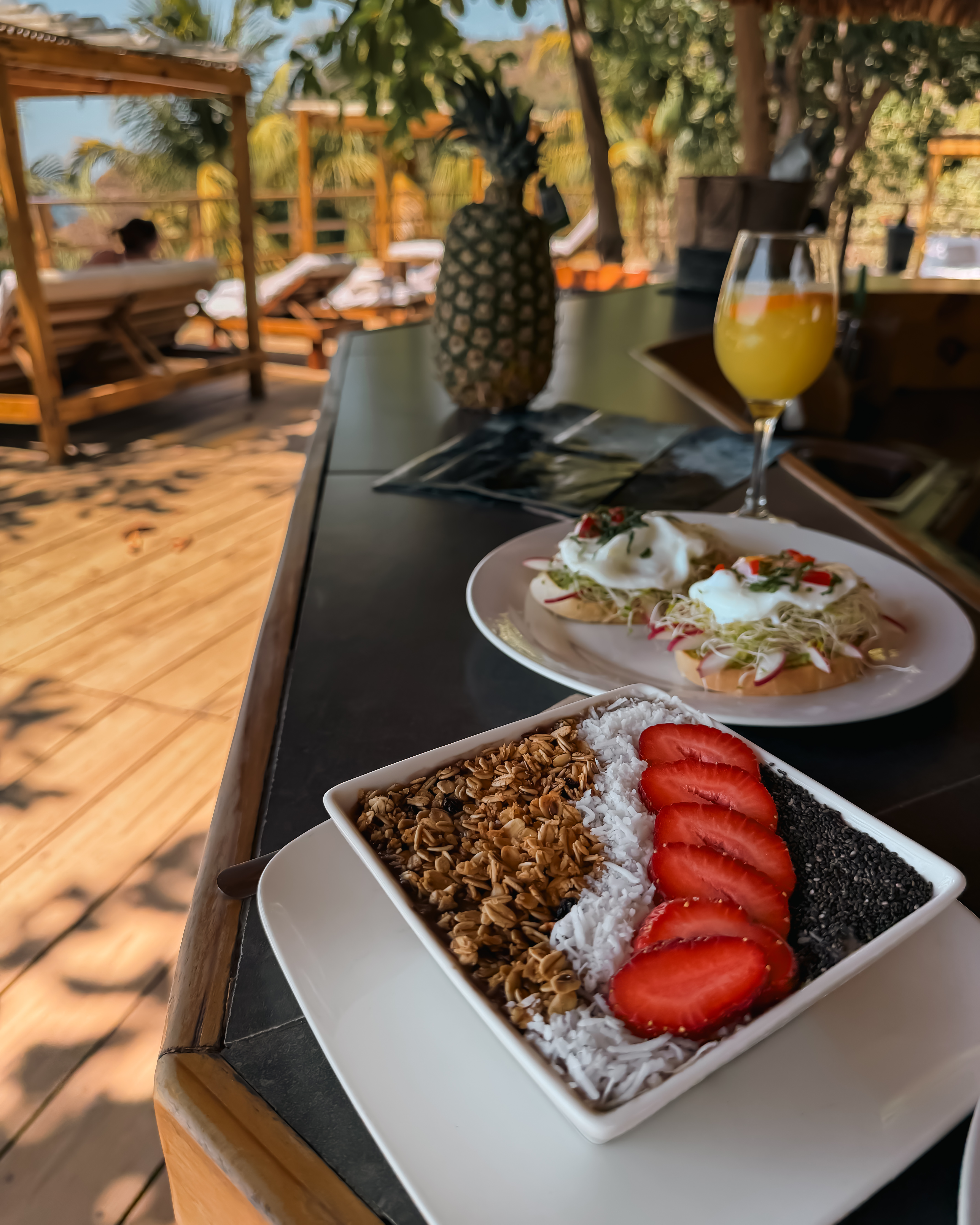 Breakfast bowl, avocado toast and pineapple