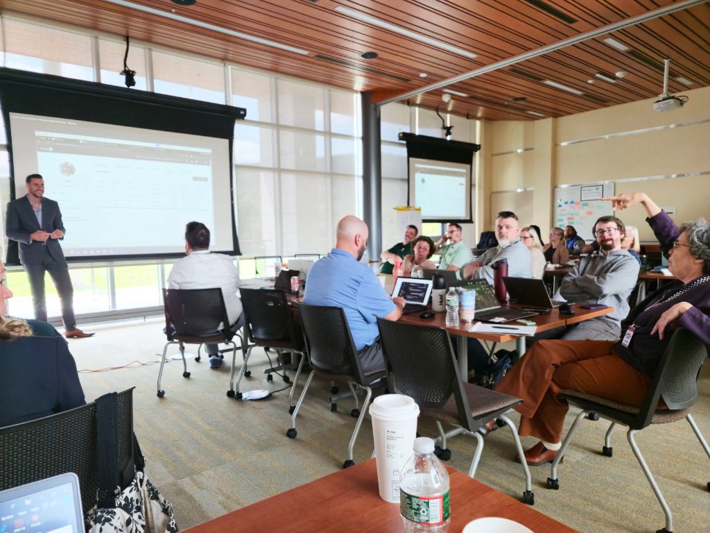 Partners collaborating during a software workshop