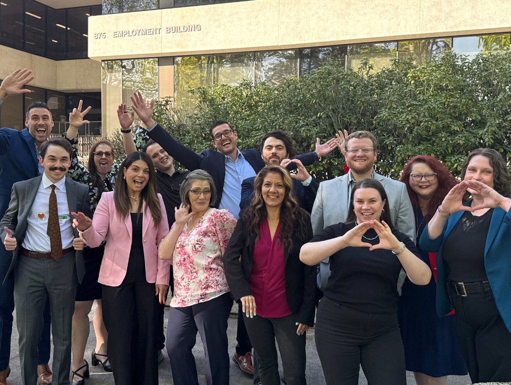 Workforce technology team gathered outside