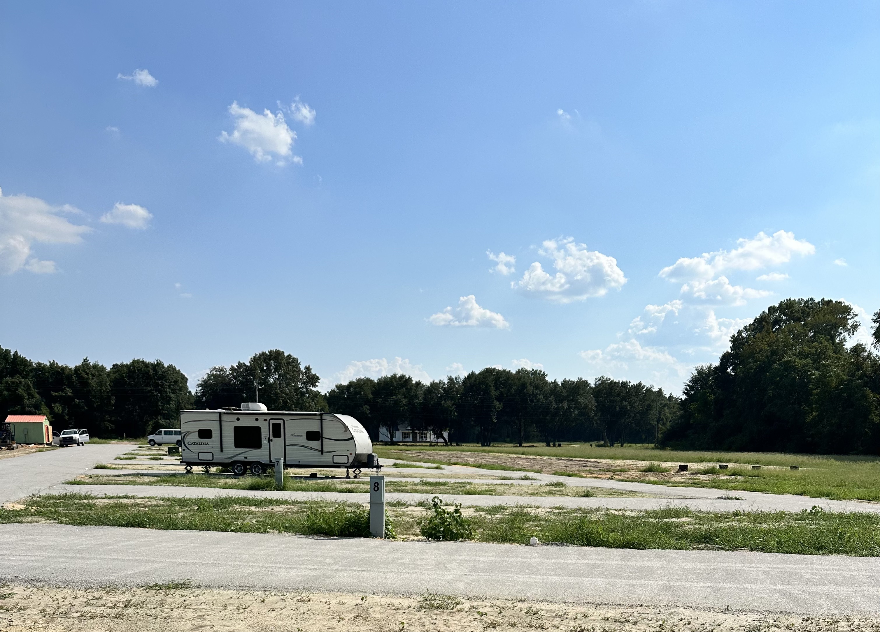 Guest travel trailer parked on site 8
