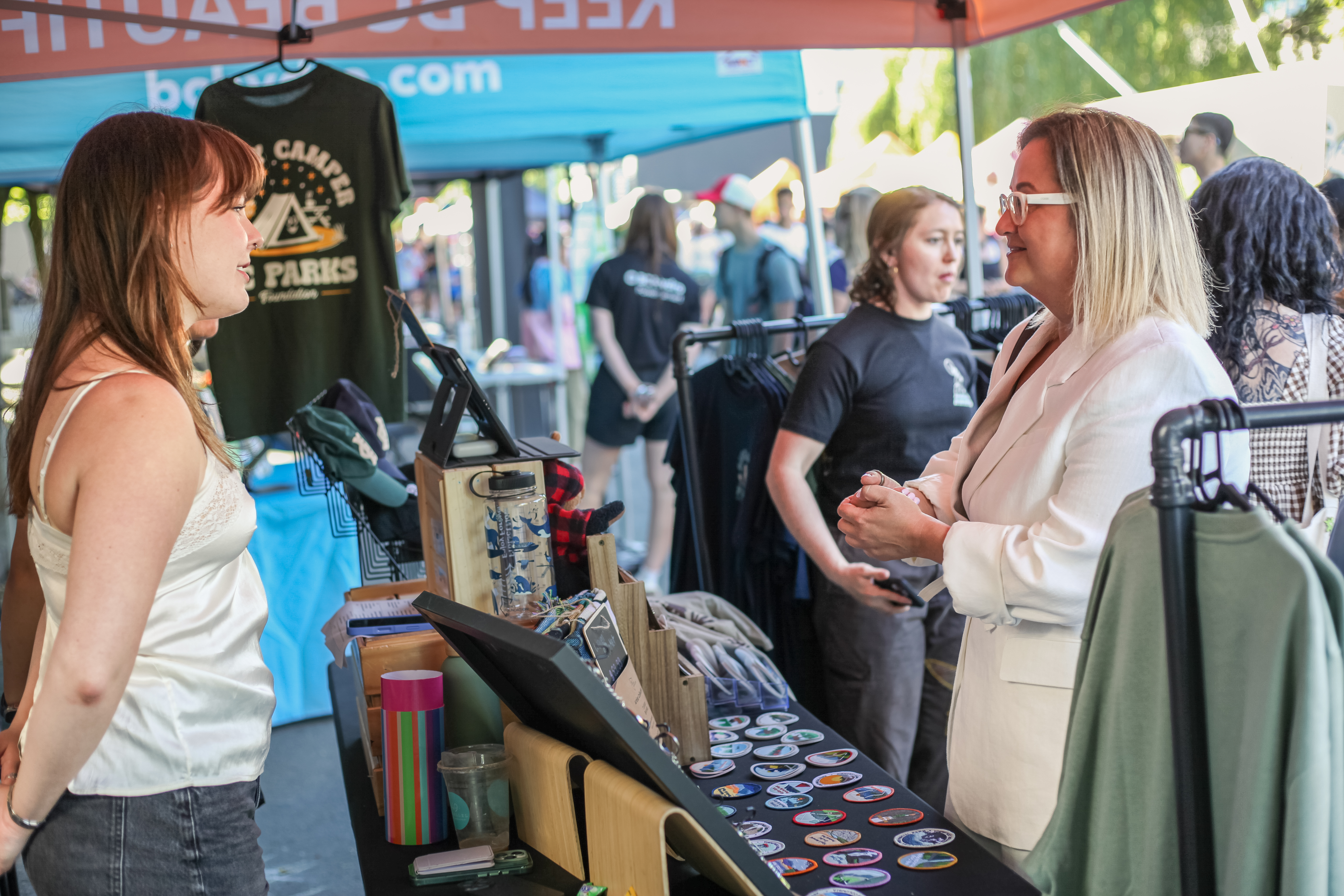 Anna Boltenko talking with North Vancouver residents at a community event