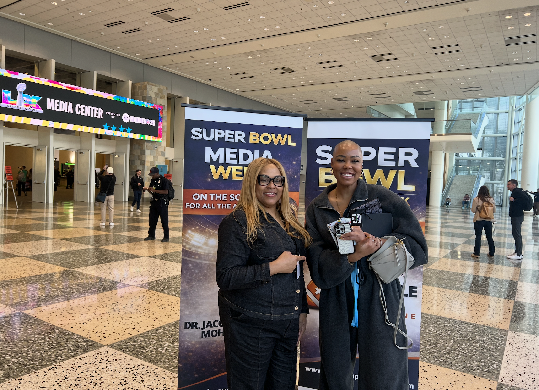 HuddleUp Magazine Super Bowl Media Week banners at the convention center