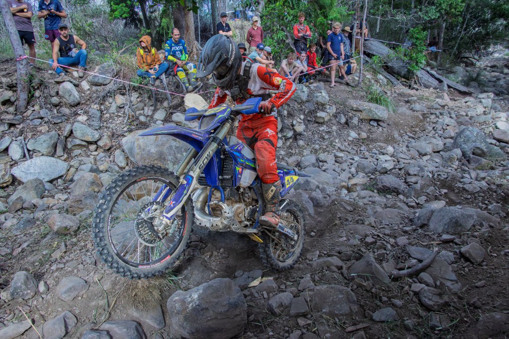 Single Track Senders rider on a rocky off-road trail