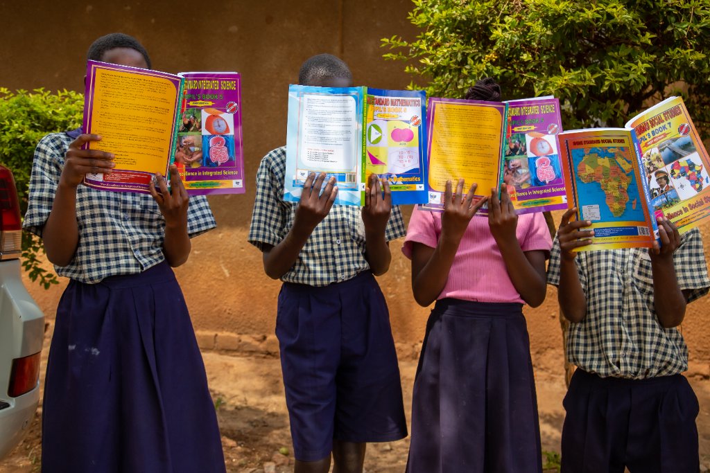 Pupils with textbooks