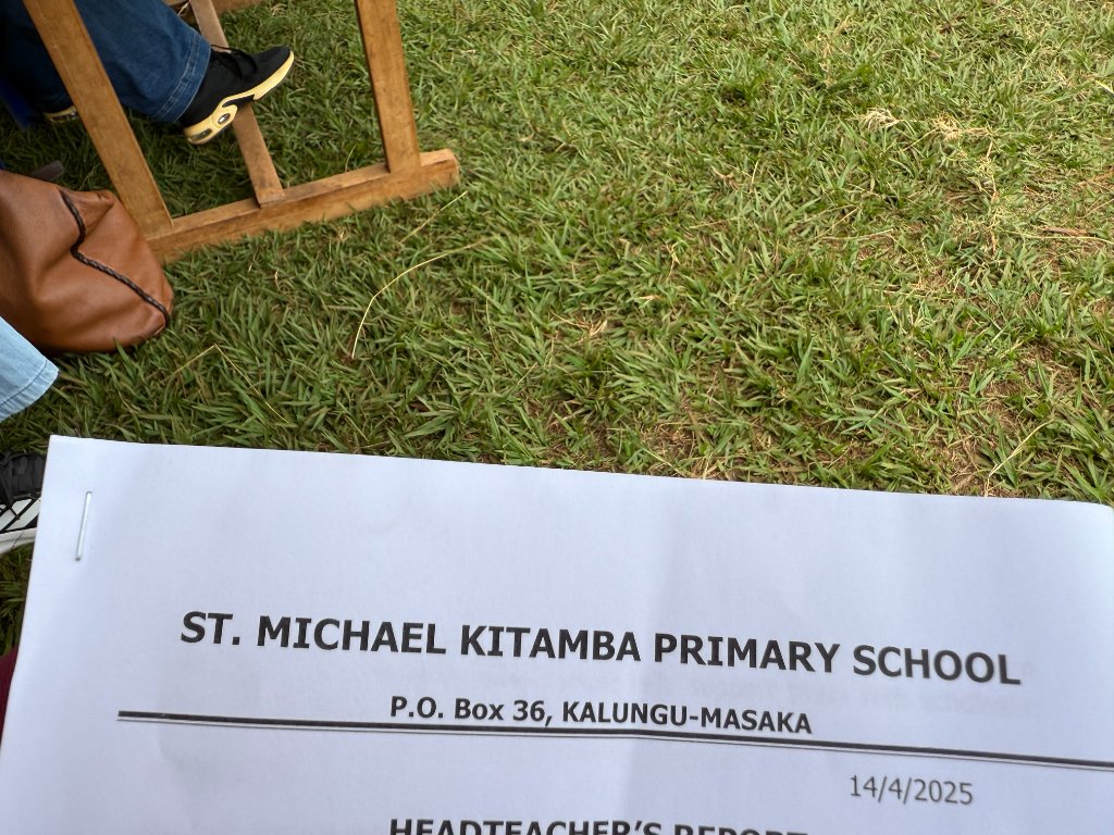 Students receiving books