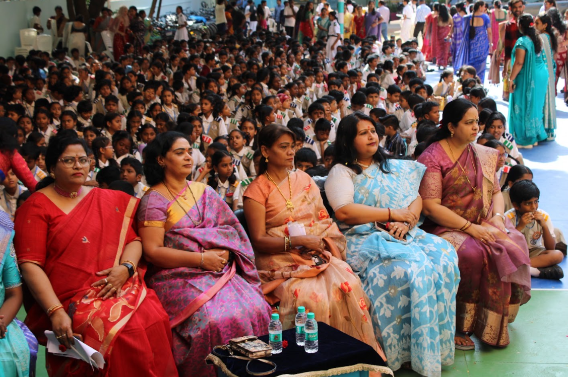 Teacher's Day — Teachers Seated Before the Student Gathering