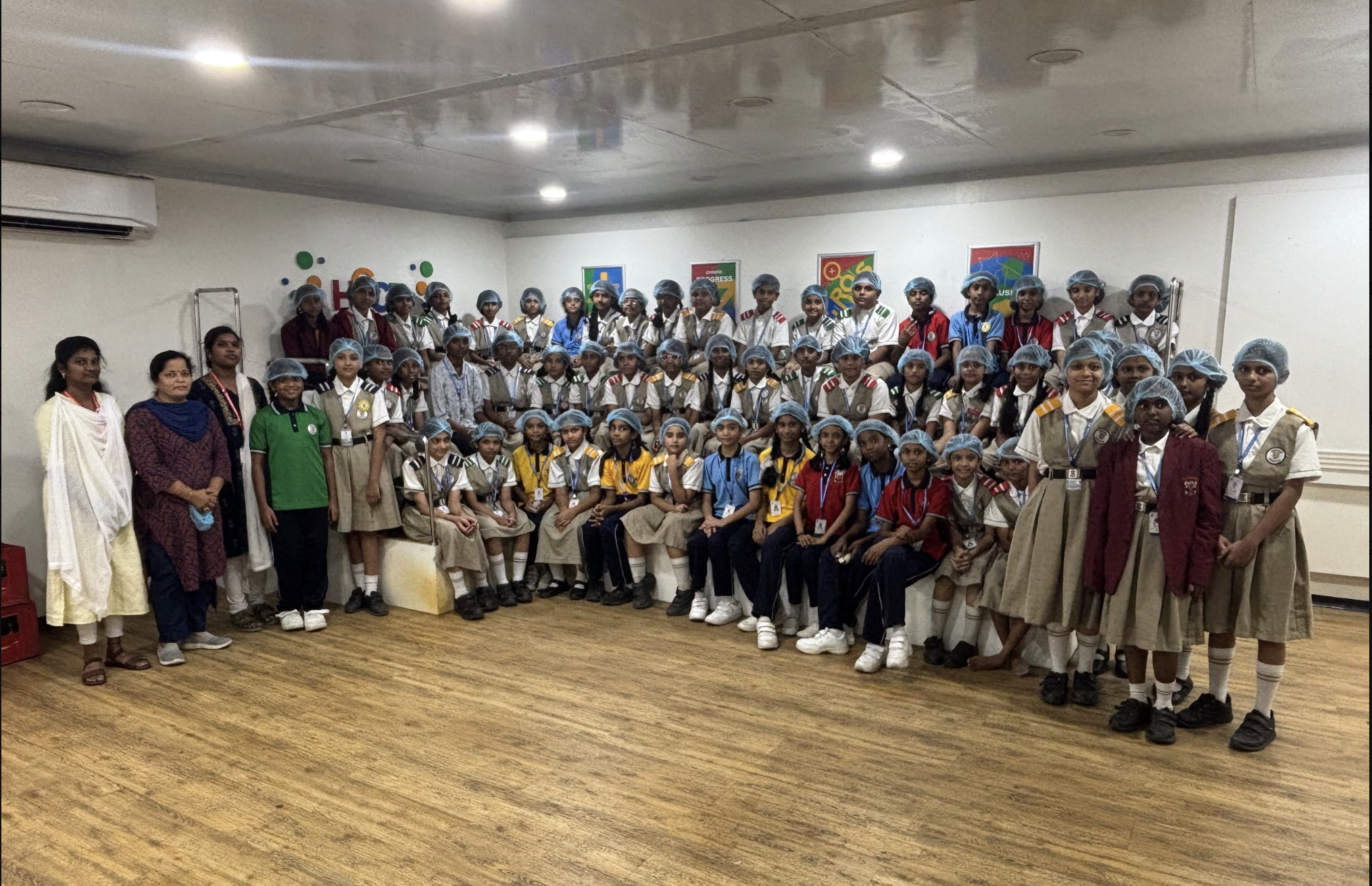 Coca-Cola Field Trip — Class Photo with Educational Posters