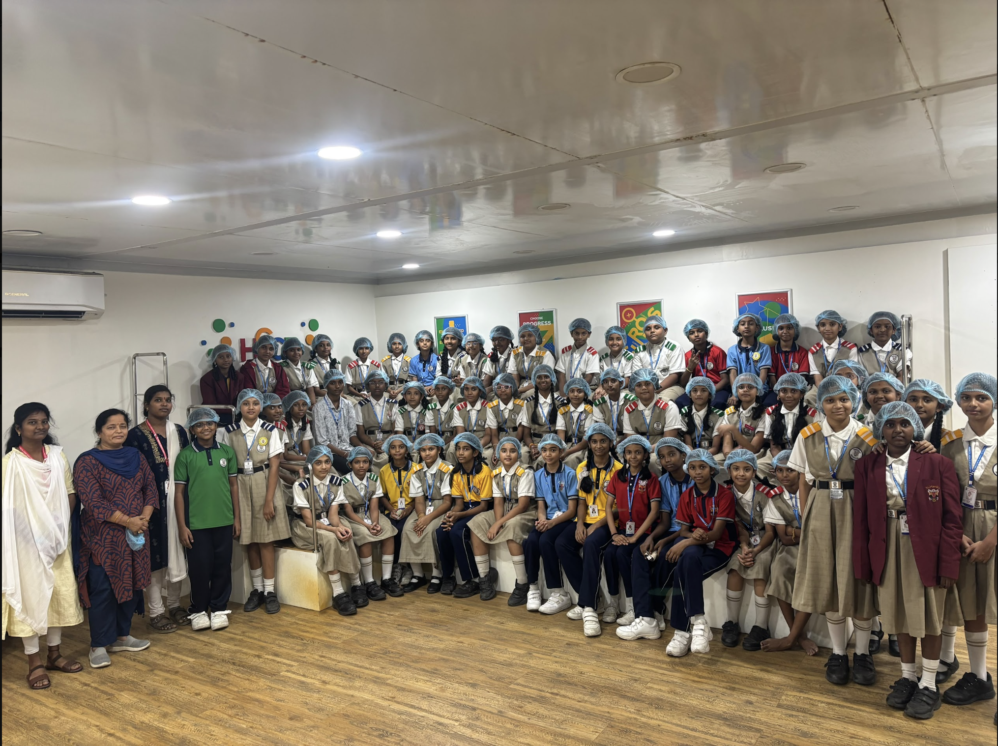 Coca-Cola Field Trip — Students in Hairnets Inside the Facility