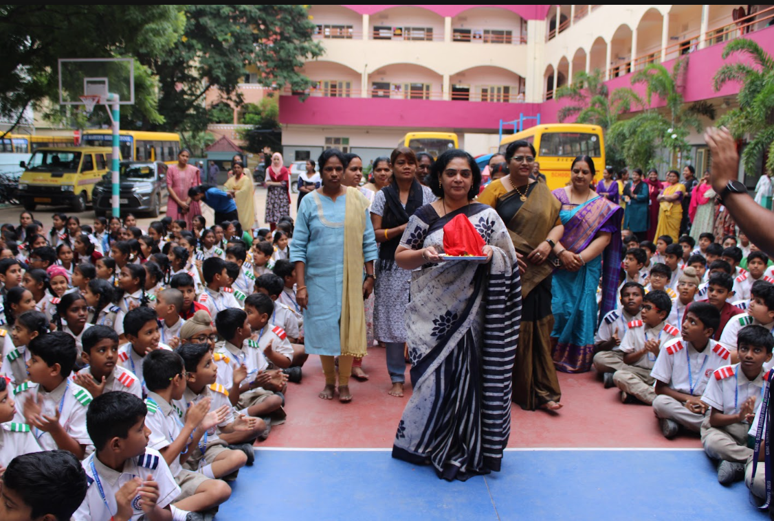 Ganesh Chaturthi — Teacher with Offerings in the Courtyard
