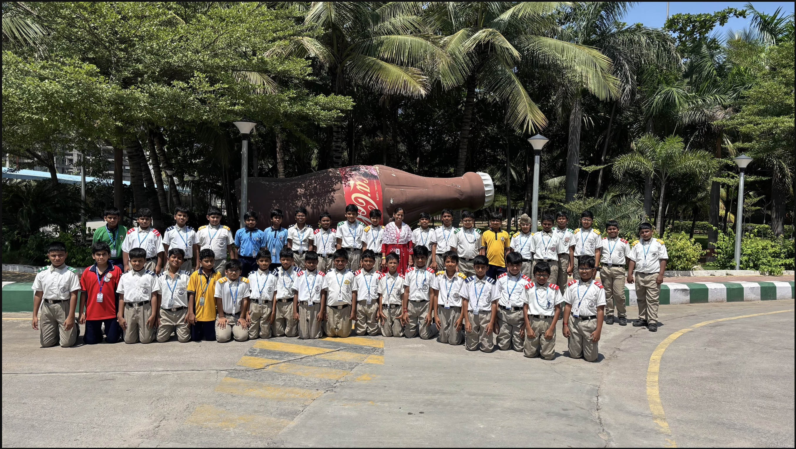 Coca-Cola Field Trip — Grade 6 Group Photo by the Giant Bottle