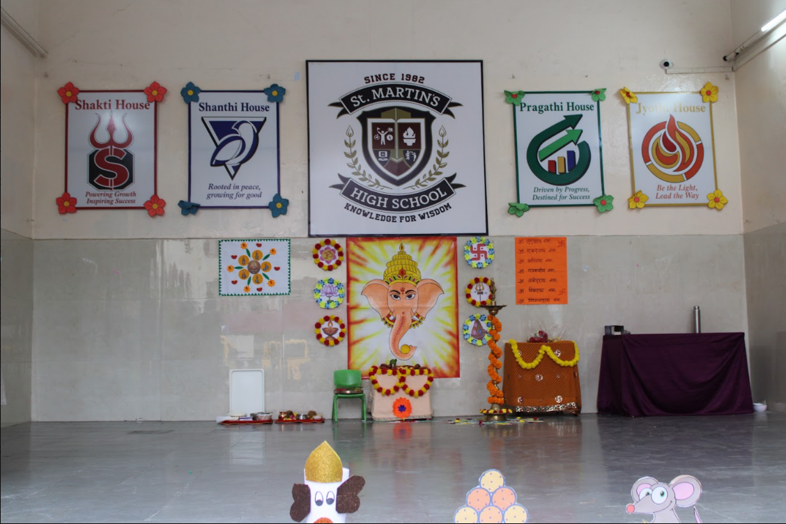Ganesh Chaturthi — Decorated Stage with Ganesha Poster