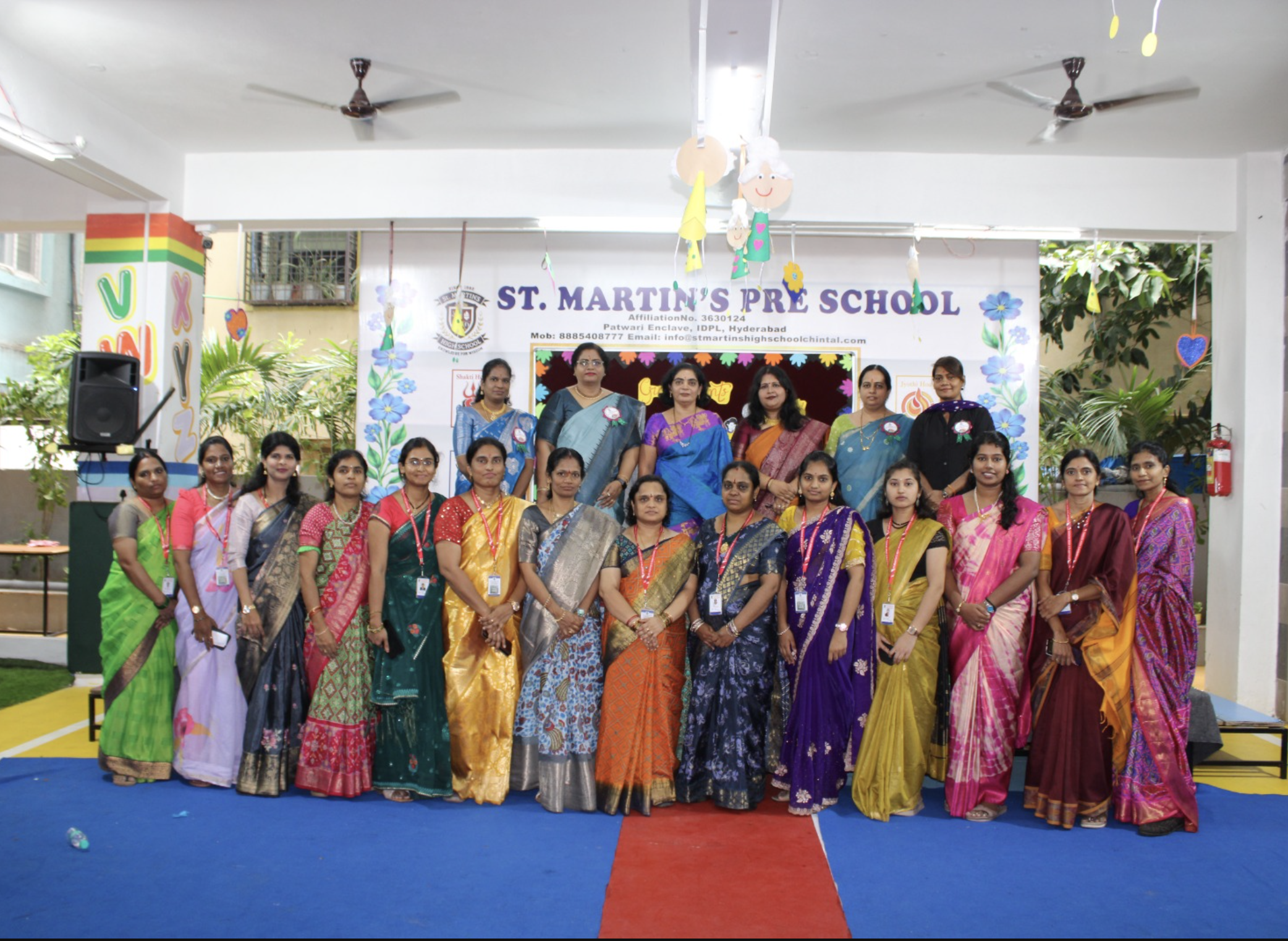 Grand Parents Day — Staff Group Photo on Stage