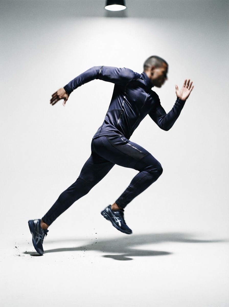 Athlete in performance tracksuit mid-stride