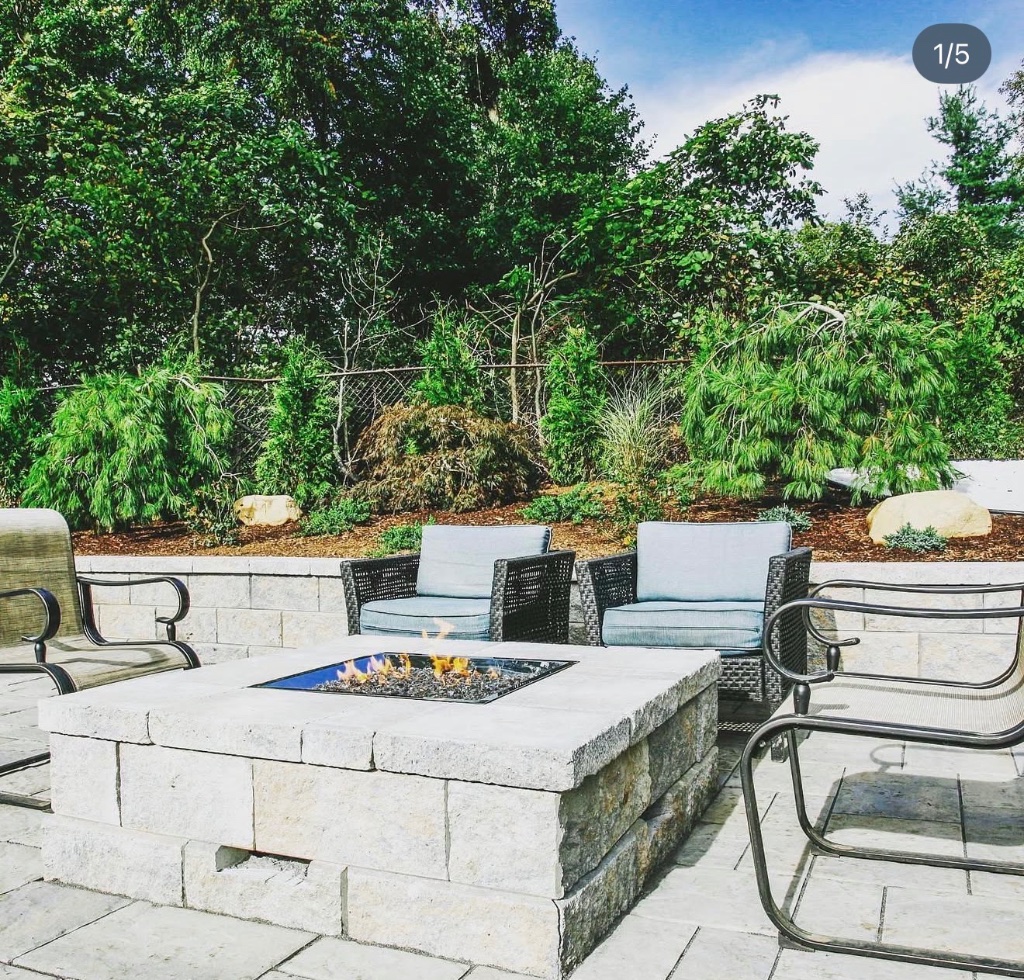 Stone Fire Pit with Seat Wall & Plantings