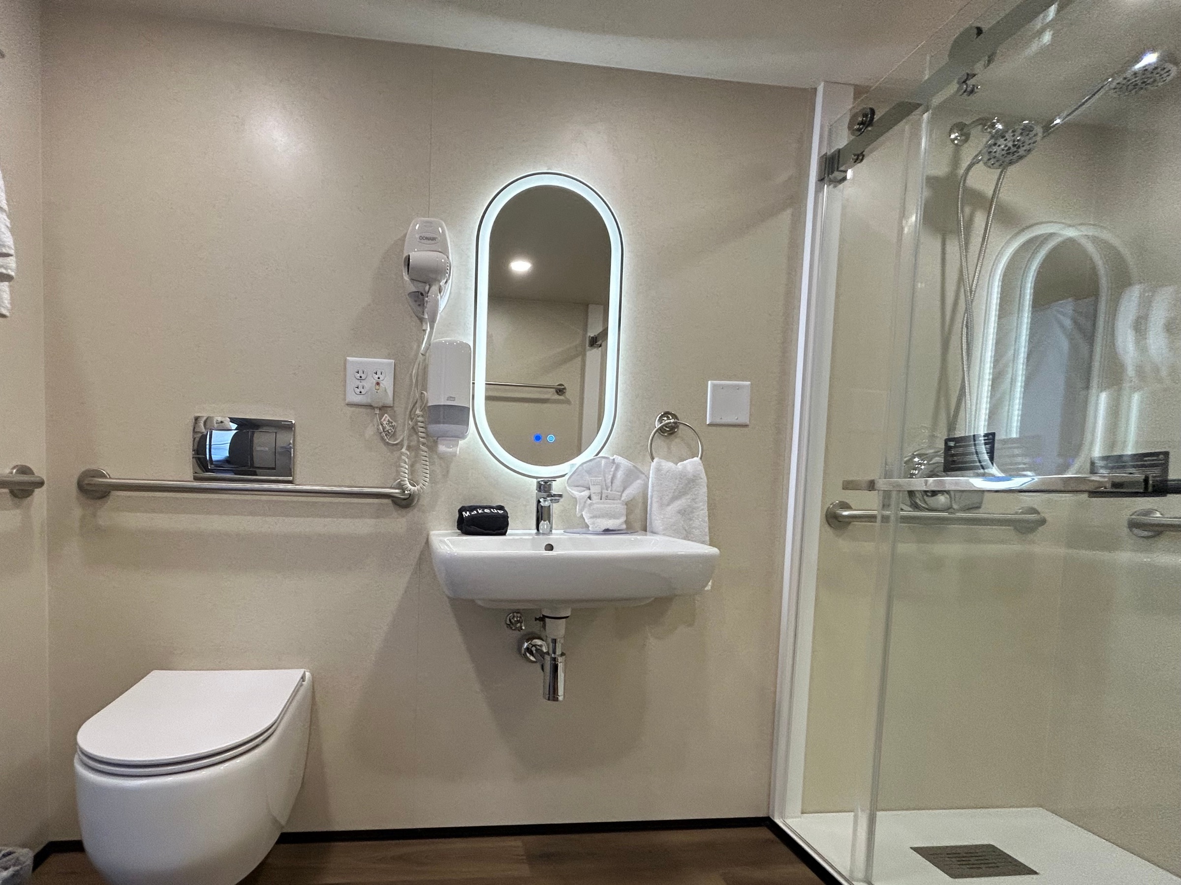 Accessible vanity and walk-in shower inside the dome