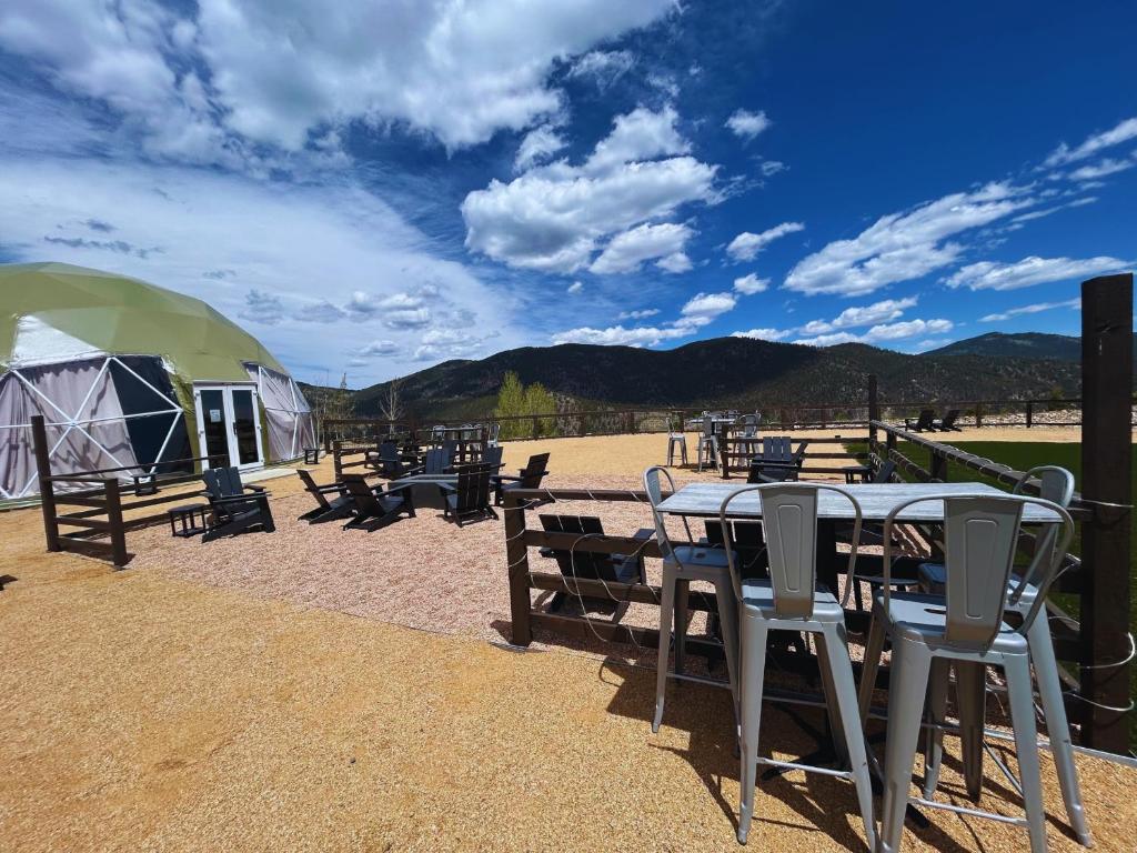 Outdoor patio and fire pit lounge at The Nest