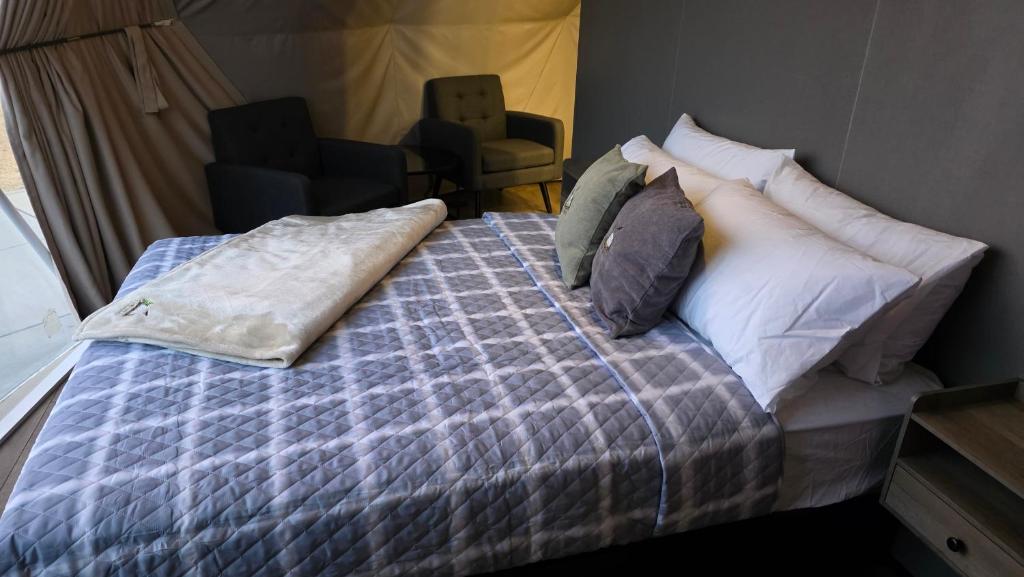 Bed and seating area inside a dome