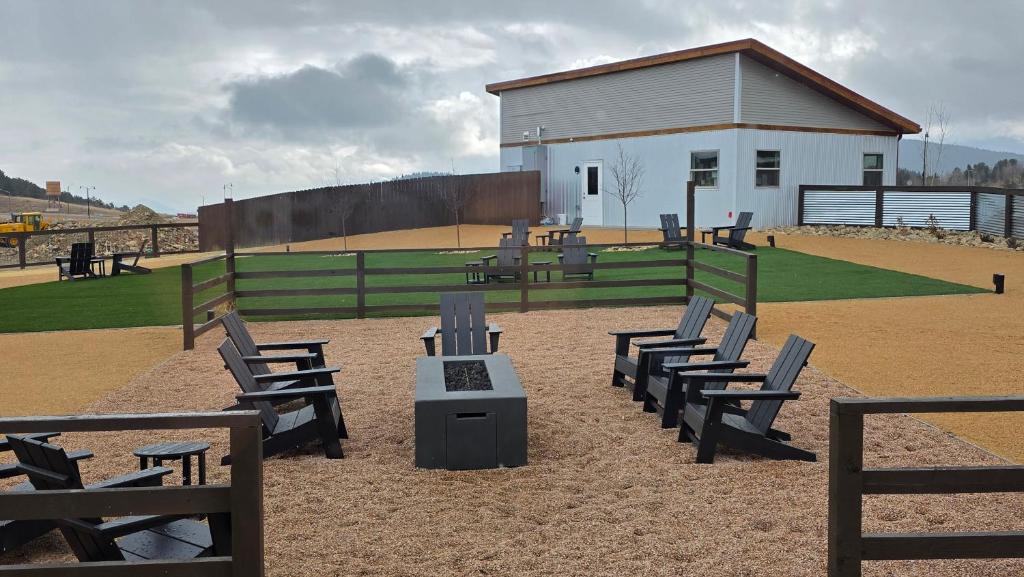 Gravel and turf lounge area with fire pit
