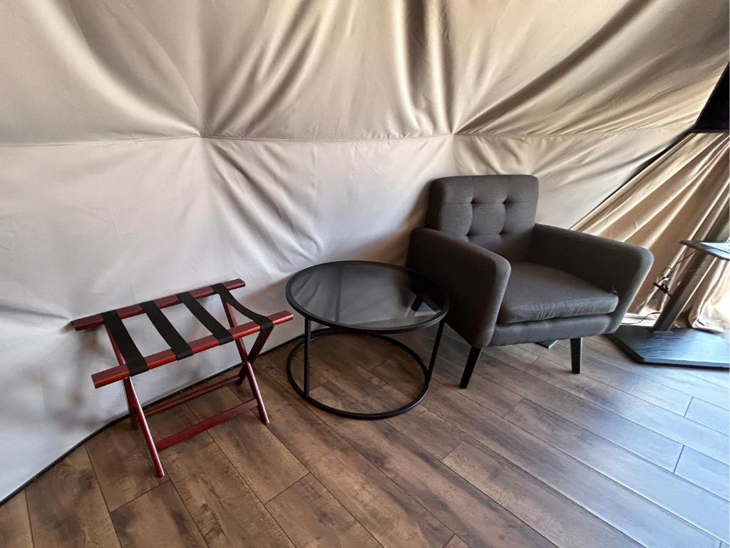 Seating nook and luggage rack inside a dome