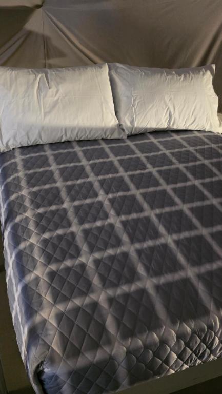 Quilted bedding inside a dome