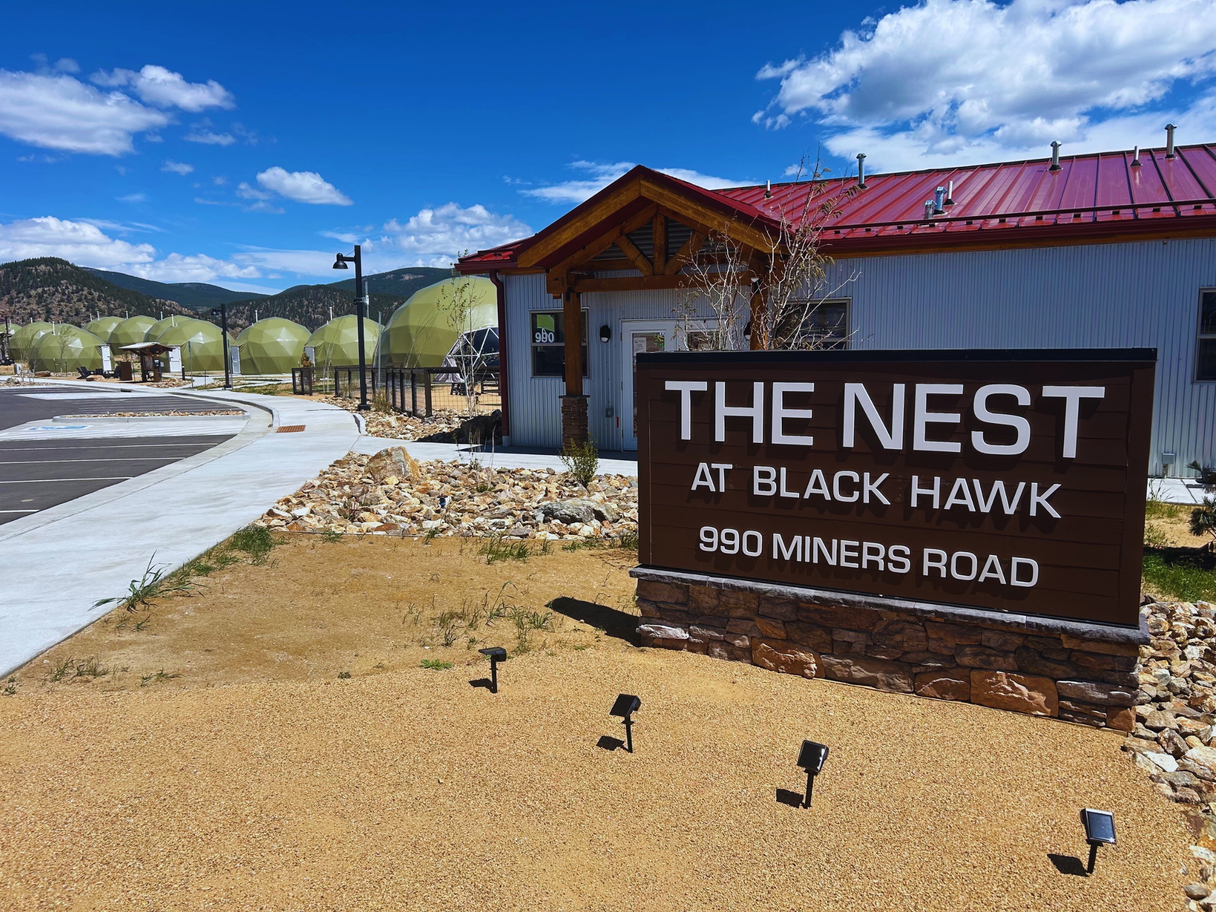The Nest at Black Hawk entrance sign at 990 Miners Road