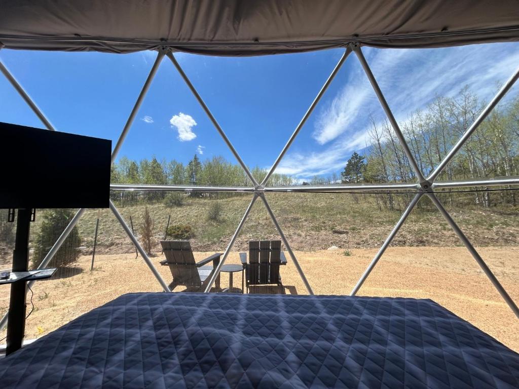 Bed and view through the dome window