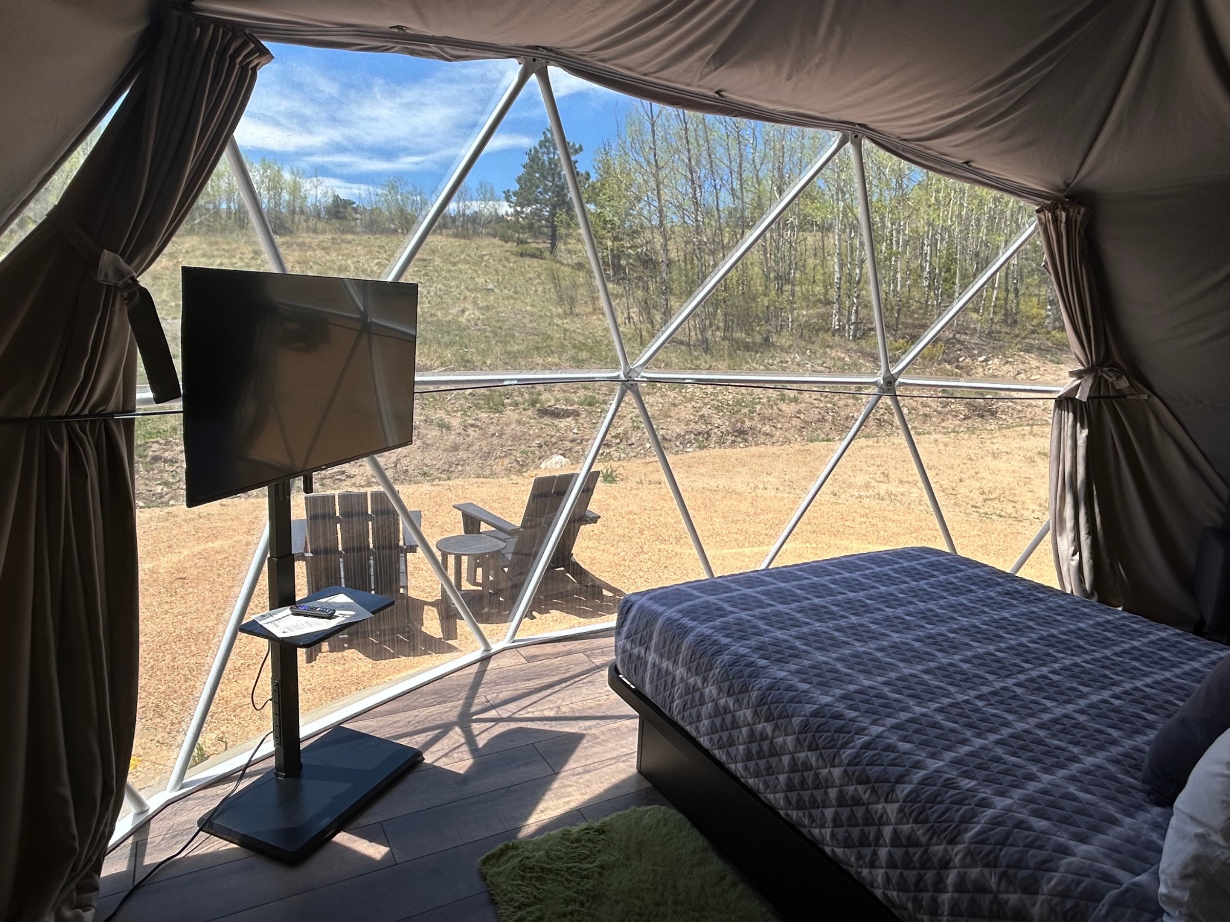 Interior view through the geodesic window of the Deluxe Garden Views Dome