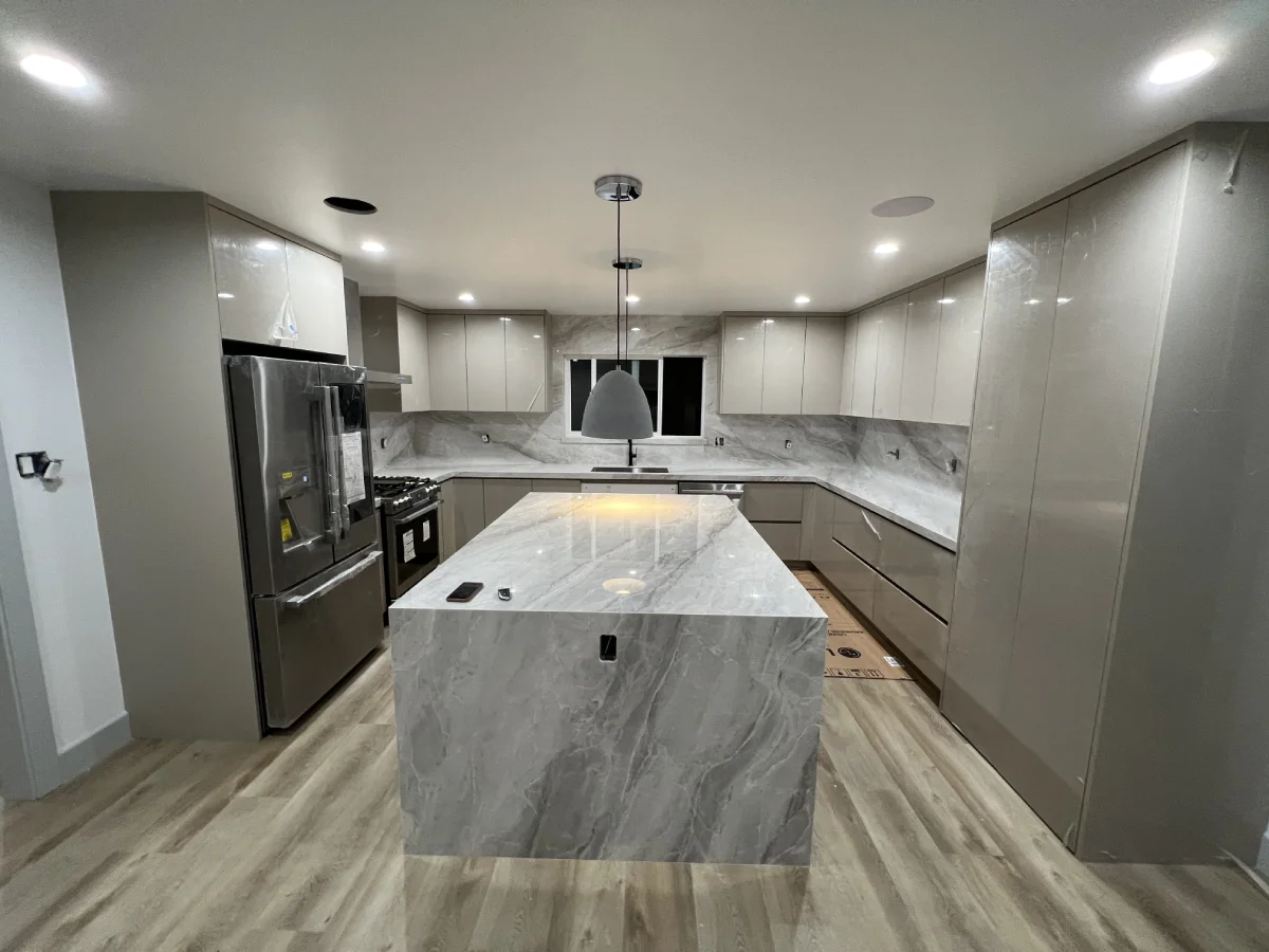 Modern kitchen remodel with marble island