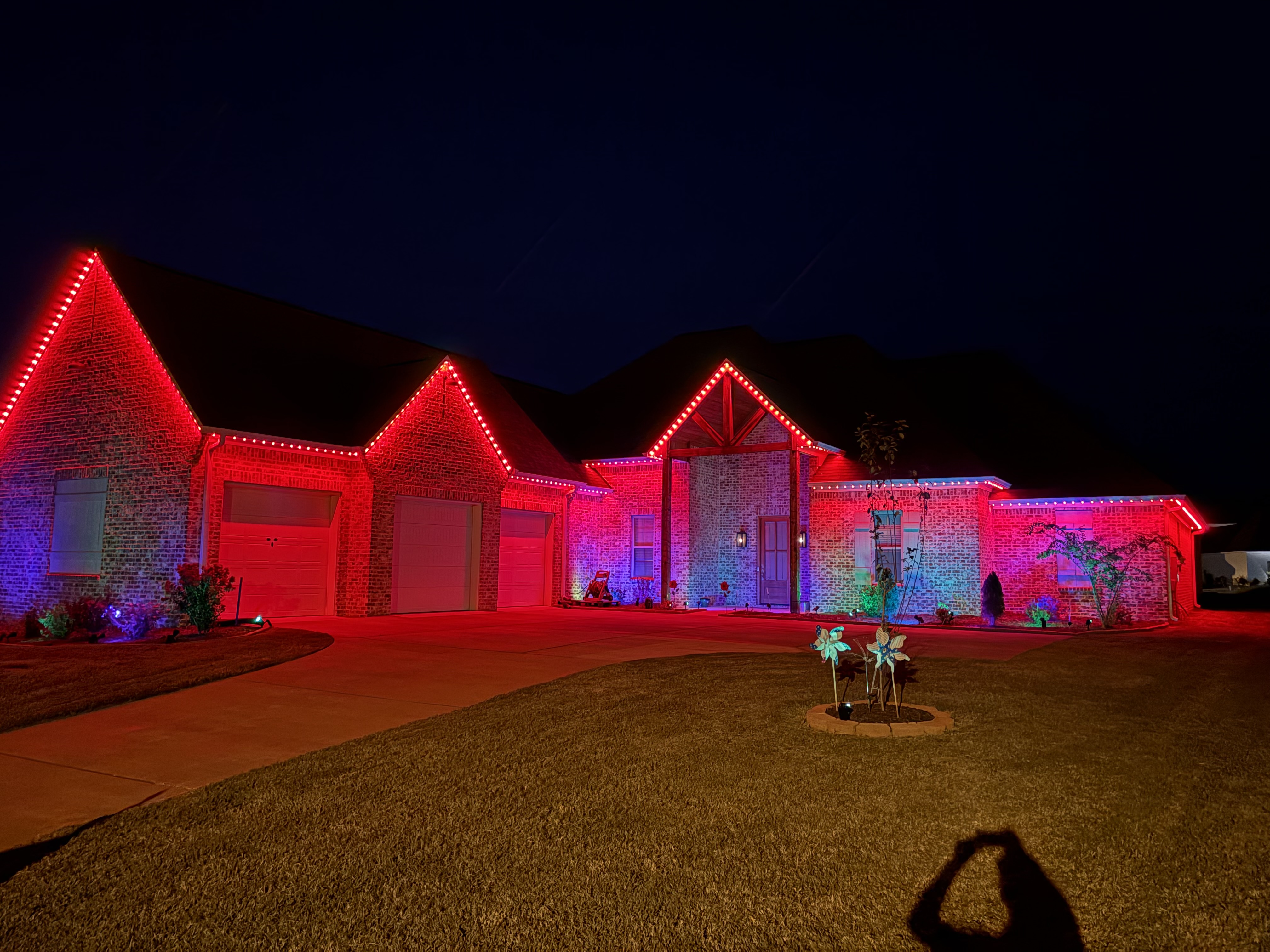 Brick home with red and blue wash LED lighting