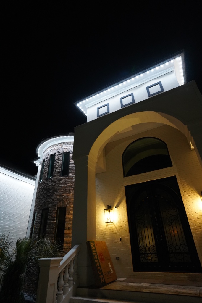 Close up of home entrance with white LED lighting