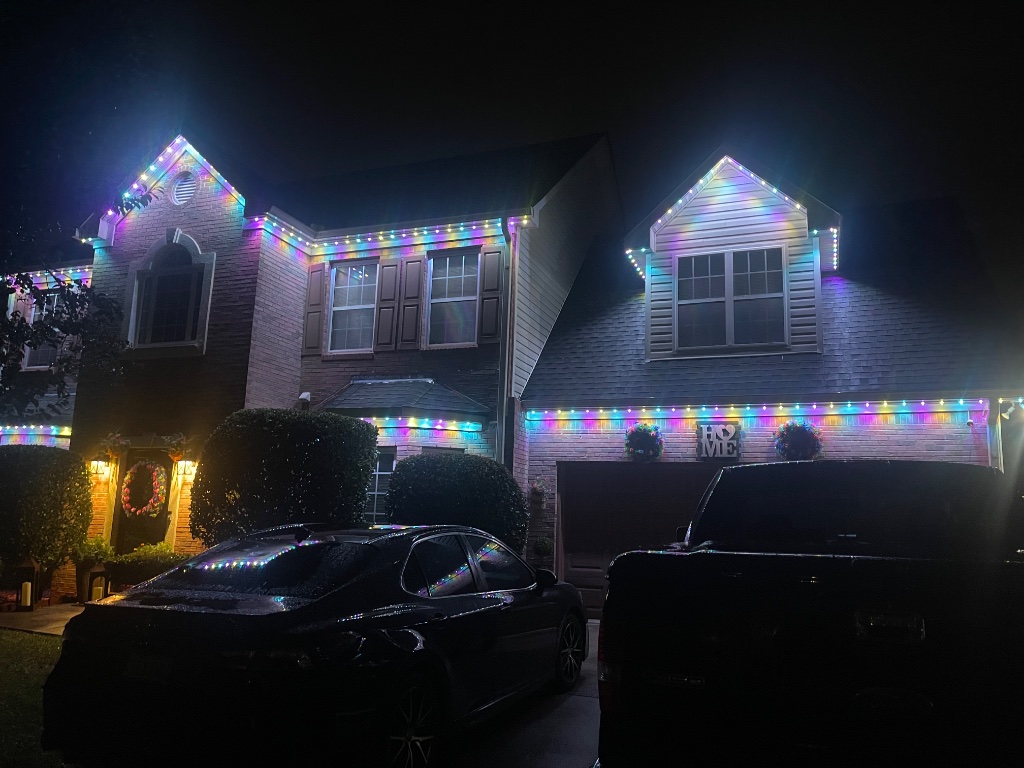 Home with colorful holiday LED lighting