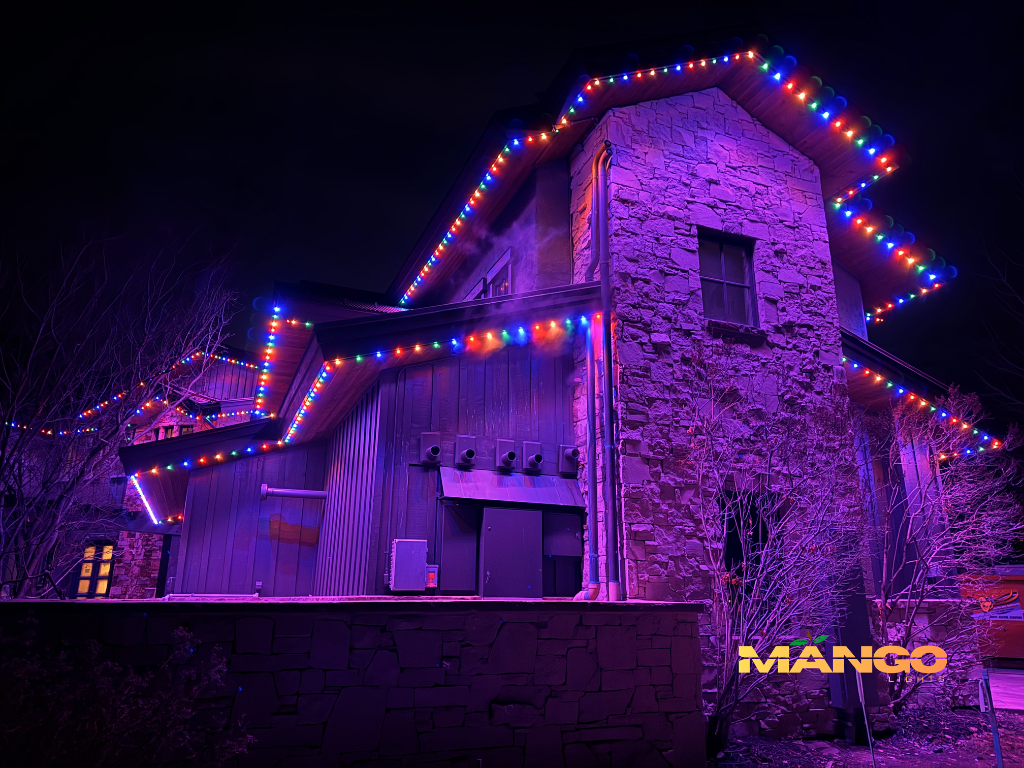 Home with colorful holiday LED lighting
