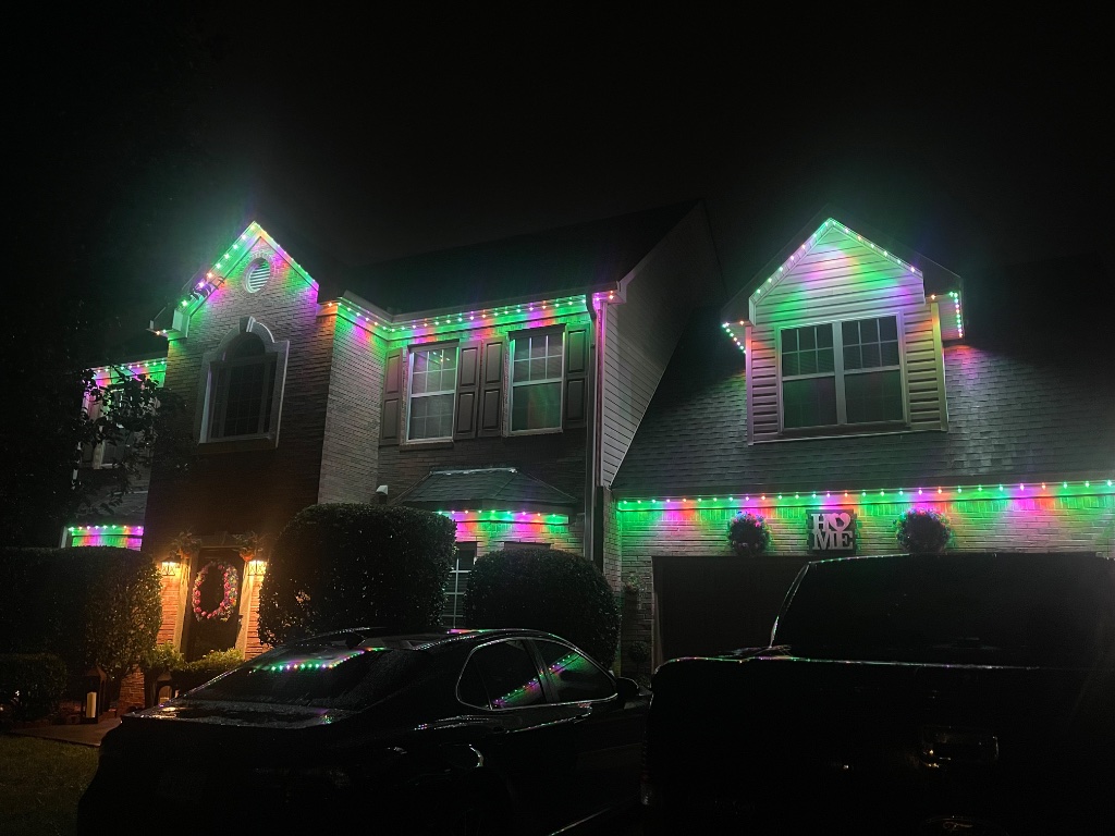 Home with colorful holiday LED lighting